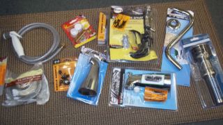 WHOLESALE LOT OF DRAINS, SPOUTS, AND OTHER PLUMBING SUPPLIES
