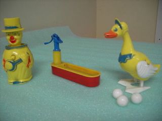 older plastic toys   Clown/Mother Goose/Water trough