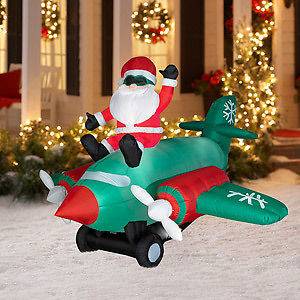 Long Animated Airblown Christmas Inflatable Santa Sitting on Twin 