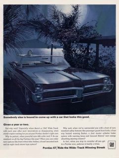 1967 AD Pontiac V8 GM wide track automobile on the lake at night 