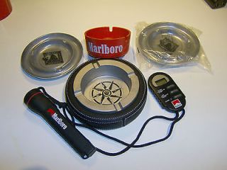 Marlboro 4 ashtrays, stop watch/timer, and flashlight