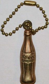 Old COCA COLA miniature gold metal bottle keychain new old stock n 