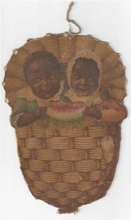 Old Ethnic Die Cut Decoration   2 Black Babies in Basket Eating 
