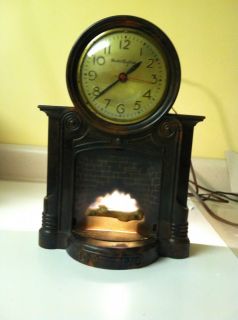 Vintage Mastercrafters fireplace clock Good for parts