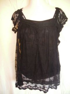 Black lace short sleeved top   with under tank top. Very elegant