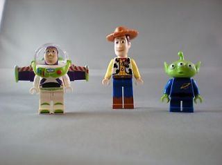 Lot of 3 Lego toy story mini figures woody buzz and alien figs pieces 