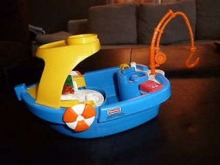  People Fisher Price Fishing boat actually floats good for tub L13