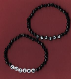 FAVOURITE ARTIST/BAND CAPTION BRACELET   CHOICE OF BLACK OR WHITE 