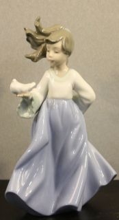 NAO BY LLADRO PORCELAIN FIGURINE (WINGED FRIEND)