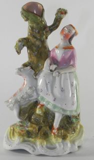 STAFFORDSHIRE POTTERY SPILL VASE GIRL WITH GOAT C1900