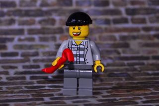 Lego City Mini Figure Prisoner with Jacket over Striped Shirt