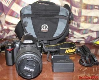 Nikon D3000 Digial Camera w/ af s Nikkor 55 200mm f/4 5.6 G ED VR Lens