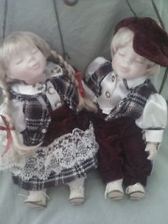 Cathay Depot Collection Set of Two Porcelain Dolls Sitting on a Swing