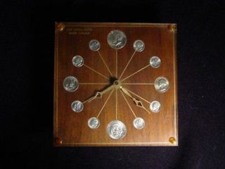   CLOCK THAT CONTAINS $2.30 OF 1964 SILVER COINS AS NUMBERS ON THE FACE