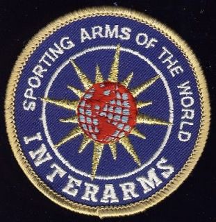 Interarms Jacket Patch Shooting Badge with BlackPlastic Pistol grips