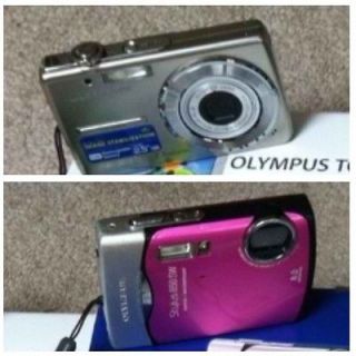 CHEAP 2 Broken Olympus Cameras   USE FOR PARTS OR FIX