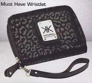 AVON~*KARDAS​HIAN KOLLECTION**MU​ST HAVE WRISTLET**BLAC​K**NEW 