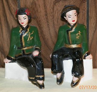 ORIENTAL COUPLE CHALK FIGURINES SITTING ON ROCKS? MATCHING CLOTHES