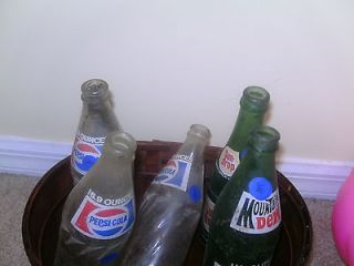 Set of 5 old soda bottles Pepsi, Mountain Drew, and Sun Drop