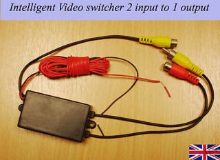 intelligent video switcher for reversing camera sensor two video input