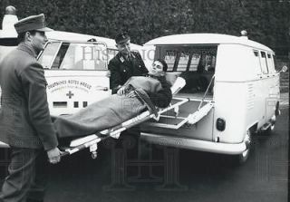   Photo German Ambulance to Italy for Italian Workers Man in Gurney