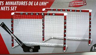 NHL DOUBLE DELUXE MINI HOCKEY GOAL NETS WITH STICKS NEW IN BOX STILL 