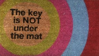The Key Is NOT Under The Mat Natural Fiber Outdoor Doormat by 