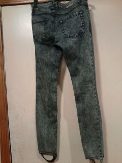 Pair of size 5 stirrup jeans.