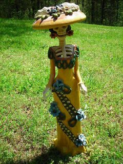 Clay figure Day of the Dead theme mexico art Skeleton in a dress 