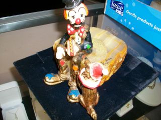 RON LEE 1982 CREATION OF CLOWN WITH HOT DOG W/ DOG SIGNED AND DATED.