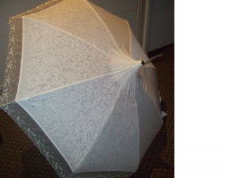 IVORY PAGODA STYLE FLORAL WEDDING STICK UMBRELLA WITH EMBRODERED TRIM 