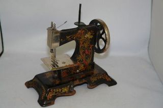antique german muller toy mini hand sewing machine from canada