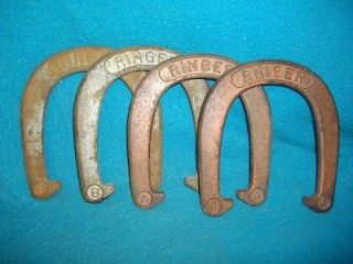e437 a set of 4 old ringer horse shoes time
