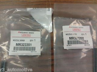   Mitsubishi Eclipse Factory OEM Windshield Washer Nozzles   Set of 2
