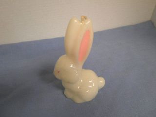 white easter bunny rabbit candle with pink eyes and ears