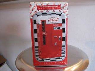 coca cola die cast collectible musical bank 