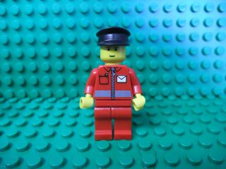 red post office lego town figure with black hat time