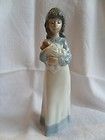 NAO BY LLADRO SOMEONE TO LOVE YOUNG LADY WITH PUPPY RETIRED FIGURINE