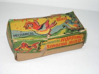 vintage tin wind up hopping singing bird toy in box