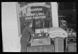 Woman in front of secondhand furniture store,San Antonio,Texas