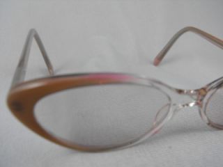 OFFERED ARE A PAIR OF BEIGE/ TAN PLASTIC EYE GLASS FRAMES THAT WERE 