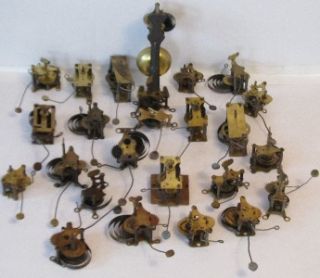 Lot of 25 Antique Brass Clock Alarm Movements 