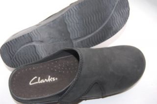 Great pair of heavy leather clogs by Clarks. These have very little 