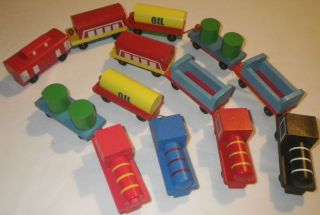   13 wooden toy trains with working wheels ages 2 by Anthony Williams GC