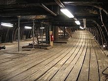 the inside of the lower gun deck looking toward the bow