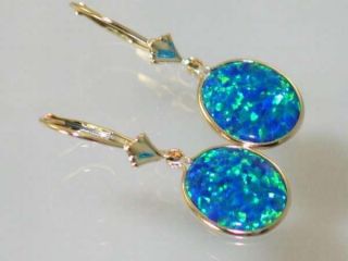 stone type blue green created opal approximate stone size 12x10mm 