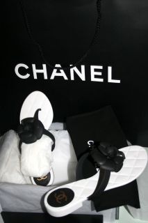 12 chanel ivory with black camellia flip flops size 39 40