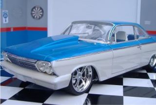 AMT 62 BEL AIR WITH RESIN COWL HOOD AND 6 PIECE MODEL DETAILING KIT. 1 
