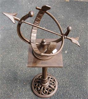 bowstring sundial with separate pedestal base cast iron in an antique 