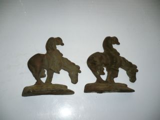 Vintage pair cast Brass bookends with indian warrier on a horse